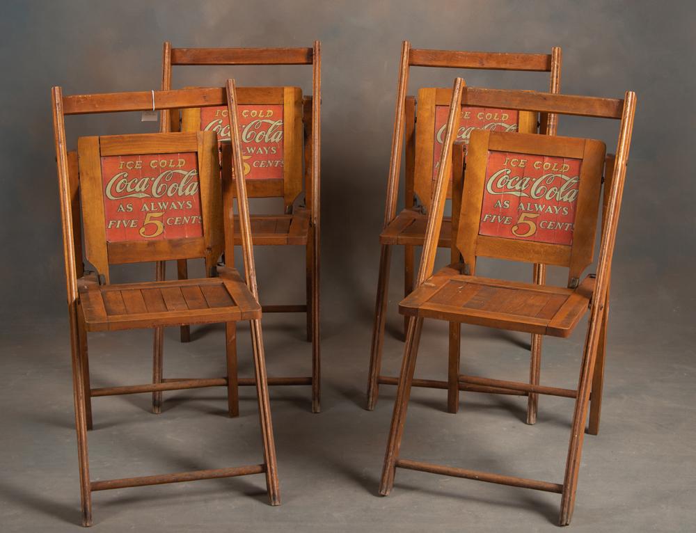 THIS LOT WILL BE SOLD 4 TIMES YOUR BID, MEANING YOUR FINAL BID WILL BE MULTIPLIED BY FOUR: Four: THIS LOT WILL BE SOLD 4 TIMES YOUR BID, MEANING YOUR FINAL BID WILL BE MULTIPLIED BY FOUR: Four vintage wooden Folding Chairs advertising "Coca-Cola 5 cent", good condition for their age, 33" T x 16" 