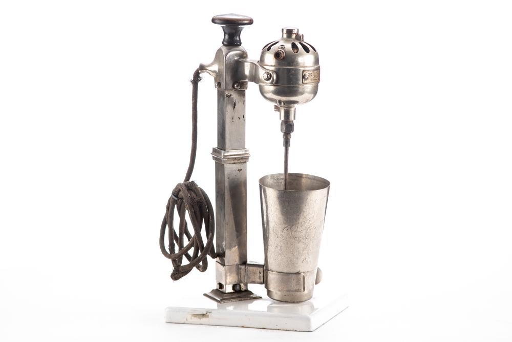 Vintage single Milk Shake Mixer, circa early 1900s with porcelain base, nickel over brass,: Vintage single Milk Shake Mixer, circa early 1900s with porcelain base, nickel over brass, manufactured by Hamilton Beach, 17" T x 8" porcelain base, in working order. BUDDY KING COLLECTION