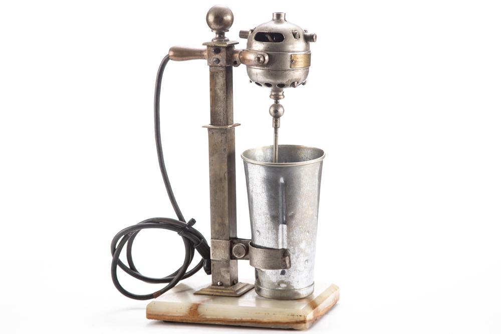 Vintage single Milk Shake Mixer, circa early 1900s with onyx base, nickel over brass, manufactured: Vintage single Milk Shake Mixer, circa early 1900s with onyx base, nickel over brass, manufactured by Hamilton Beach, 17" T x 8" porcelain base, in working order. BUDDY KING COLLECTION
