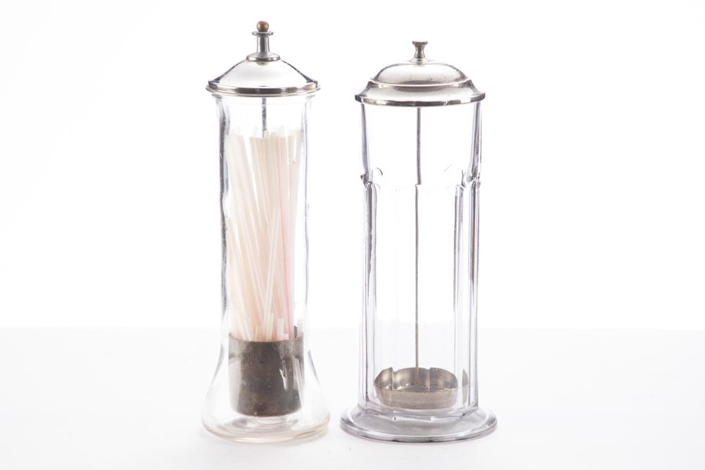 THIS LOT WILL BE SOLD 2 TIMES YOUR BID, MEANING YOUR FINAL BID WILL BE MULTIPLIED BY TWO: Two: THIS LOT WILL BE SOLD 2 TIMES YOUR BID, MEANING YOUR FINAL BID WILL BE MULTIPLIED BY TWO: Two vintage glass Straw Holders with metal lids, one is a thin Straw Holder measures 11 3/4" T x 3 1/2" diamet