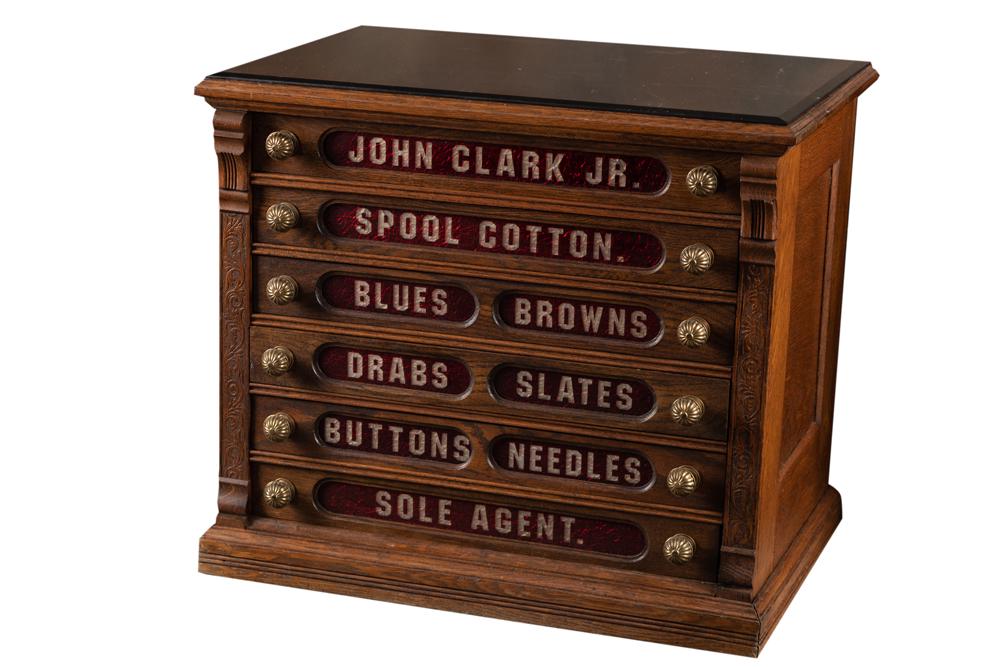 Antique oak case, six drawer Clark's ONT Spool Cabinet in excellent condition, very desirable model: Antique oak case, six drawer Clark's ONT Spool Cabinet in excellent condition, very desirable model with ruby red etched glass windows and original fluted brass knobs (handles), circa 1890. Paper labe