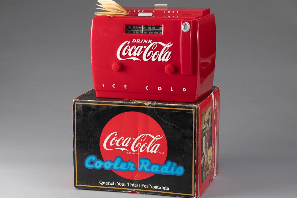 New in box Collector's Edition of the Coca-Cola Cooler Radio, circa 1980s making this collector's: New in box Collector's Edition of the Coca-Cola Cooler Radio, circa 1980s making this collector's item over 40 years old, in original shipping box. Radio is in playing order and pristine condition, me