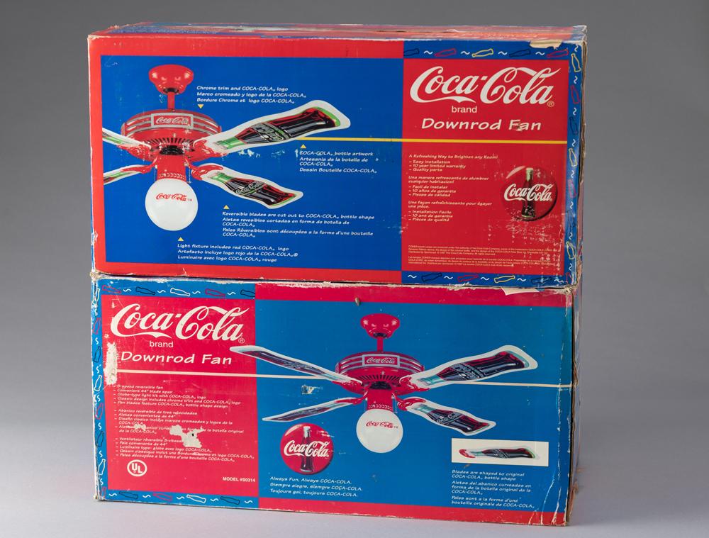 THIS LOT WILL BE SOLD 2 TIMES THE BID, MEANING YOUR FINAL BID WILL BE MULTIPLIED BY TWO. Two new: THIS LOT WILL BE SOLD 2 TIMES THE BID, MEANING YOUR FINAL BID WILL BE MULTIPLIED BY TWO. Two new unopened boxes Coca-Cola Ceiling Fans as pictured on box, 44" blades, three speed & reversible, shaped 