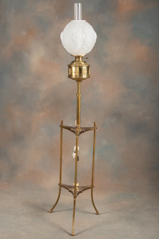 Unique antique Victorian brass Piano Lamp, circa 1890 with adjustable font with unique onyx finial: Unique antique Victorian brass Piano Lamp, circa 1890 with adjustable font with unique onyx finial in center at base, 10" diameter frosted shade with embossed grapes. This lamp was originally in oil b
