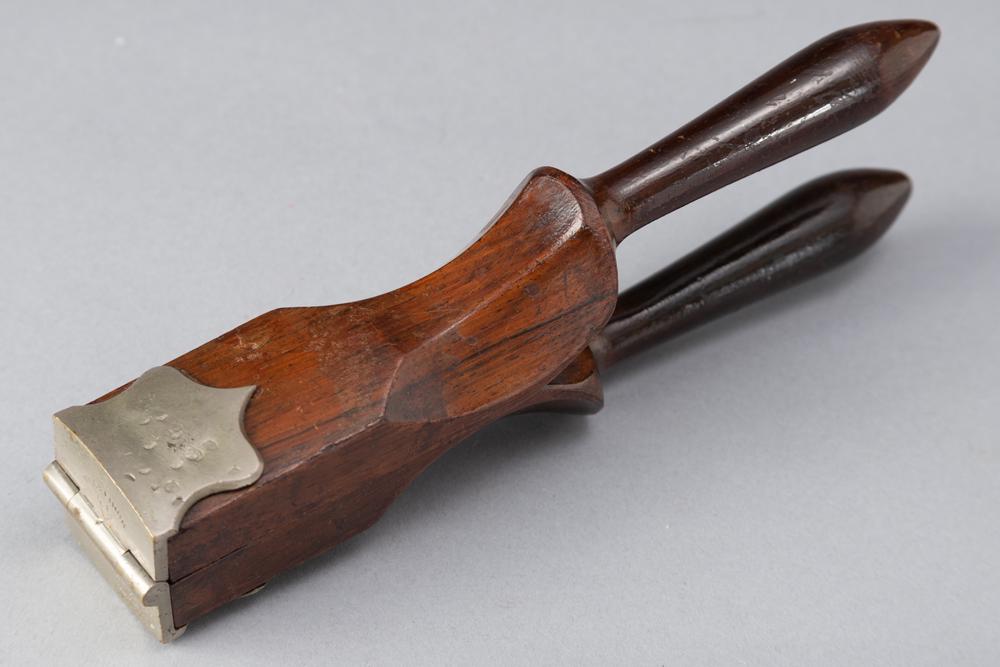 Rosewood & brass antique Juicer marked "Will & Finck S.F.", circa 1900, Will & Finck is mostly known: Rosewood & brass antique Juicer marked "Will & Finck S.F.", circa 1900, Will & Finck is mostly known for push daggers and gambling devices. Juicer measures 9 3/8" L. BUDDY KING COLLECTION