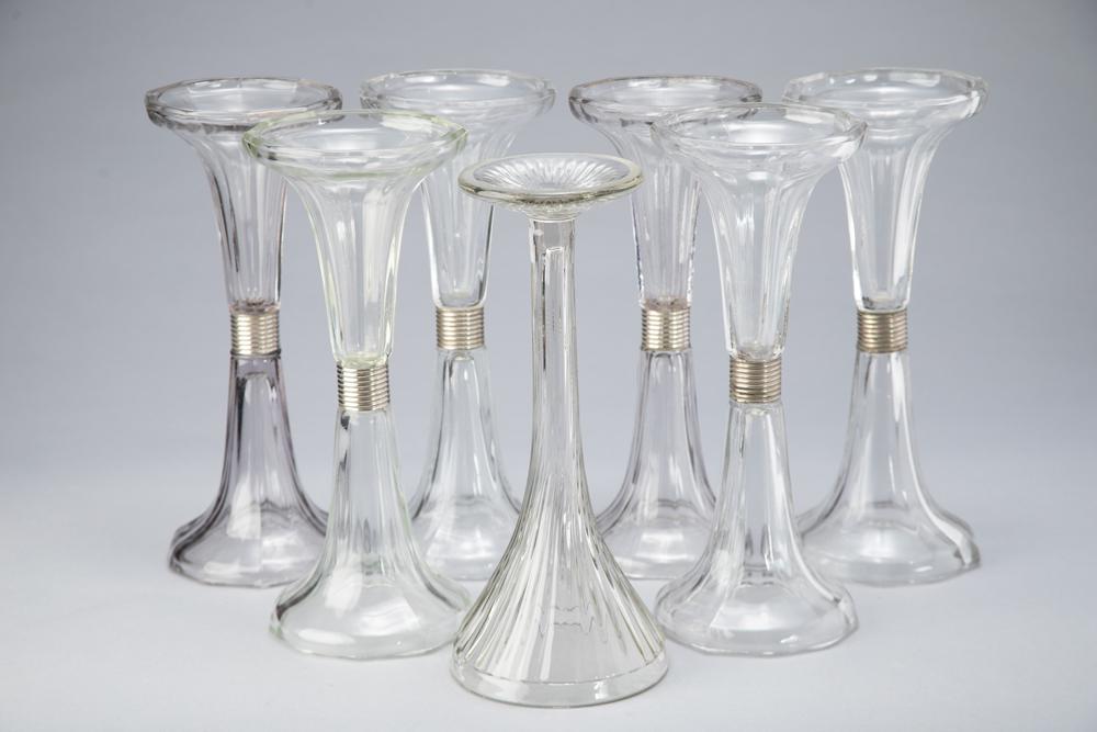 Collection of seven (7) glass Shelf Supports, 12" T, six match, one is odd, circa 1920s-1930s, all: Collection of seven (7) glass Shelf Supports, 12" T, six match, one is odd, circa 1920s-1930s, all are in good condition. BUDDY KING COLLECTION.