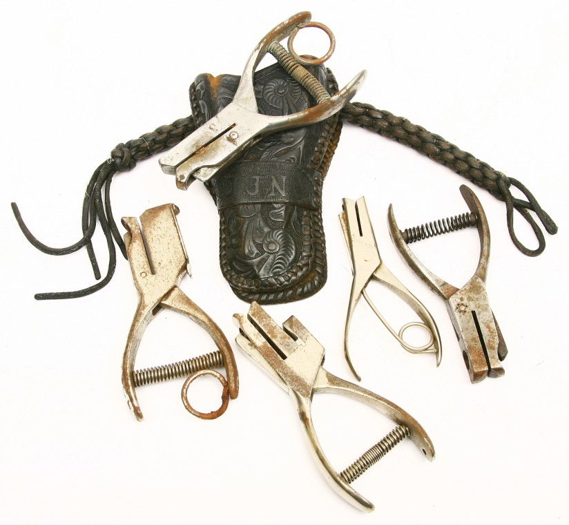 Unique hand tooled holster for R.R. ticket punch a: Unique hand tooled holster for R.R. ticket punch and 5 ticket punches. Sold as one lot.