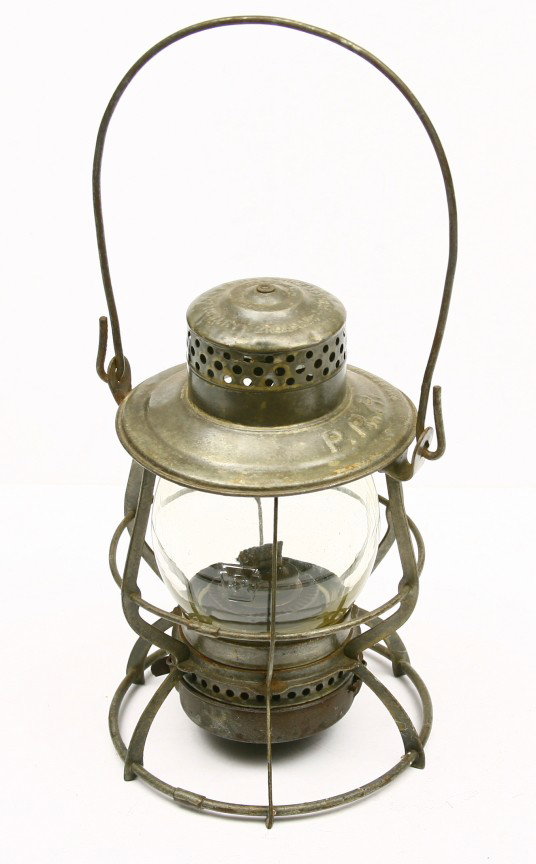 P.R.R. marked lantern has bottom adjustable wick w: P.R.R. marked lantern has bottom adjustable wick w/ embossed P.R.R. marked globe by Keystone.