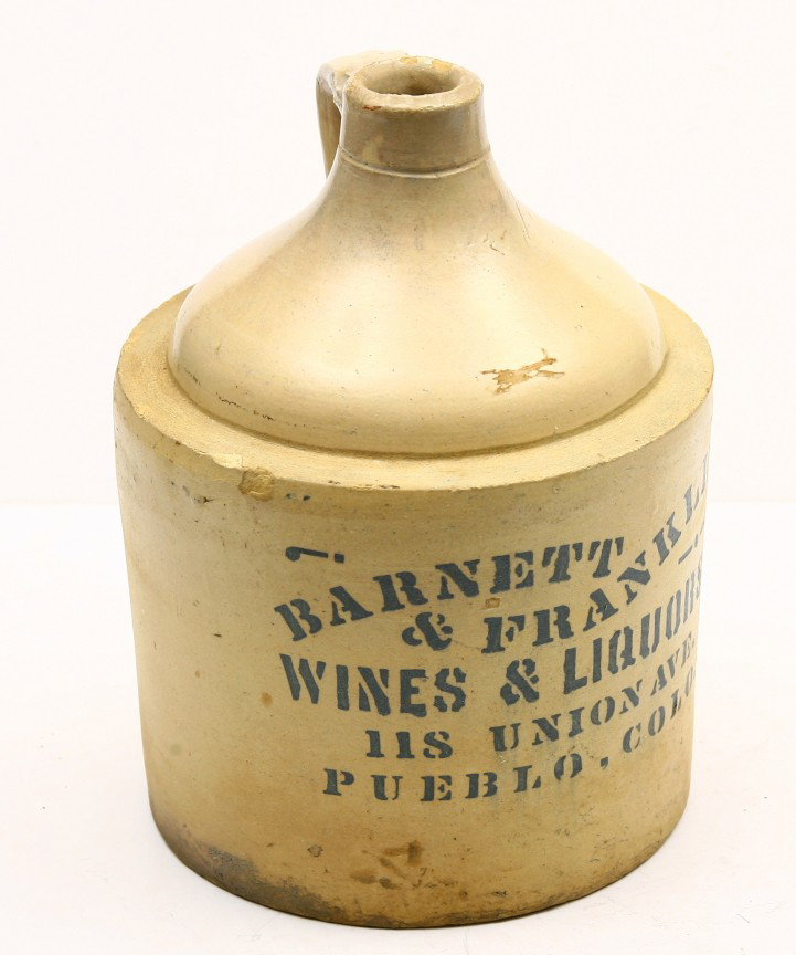 BARNETT & FRANKLIN WINES & LIQUOURS, PUEBLO, COLO.: BARNETT & FRANKLIN WINES & LIQUOURS, PUEBLO, COLO. 10" tall, one gallon crock w/ hair line crack in rear and small chip.