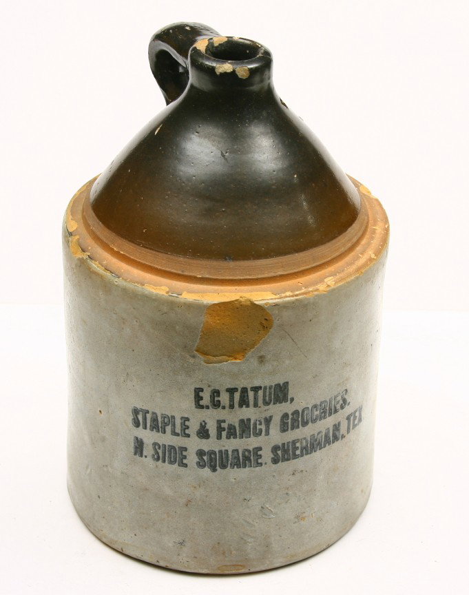 E.C. TATUM STAPLES & FANCY GROCRIES, SHERMAN, TEXA: E.C. TATUM STAPLES & FANCY GROCRIES, SHERMAN, TEXAS, 14" tall two gallon crock, heavy chip and hole in top.