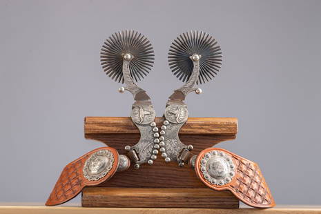 Awesome pair of Lytle & Mower double mounted Spurs with hand engraved silver overlay and beaded: Awesome pair of Lytle & Mower double mounted Spurs with hand engraved silver overlay and beaded silver border. Spurs have raised steer head conchos on heel bands and matching floral engraved conchos