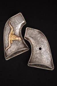 Fine pair of "E.H. Bohlin" marked, hand engraved sterling silver Grips for a Colt Single Action