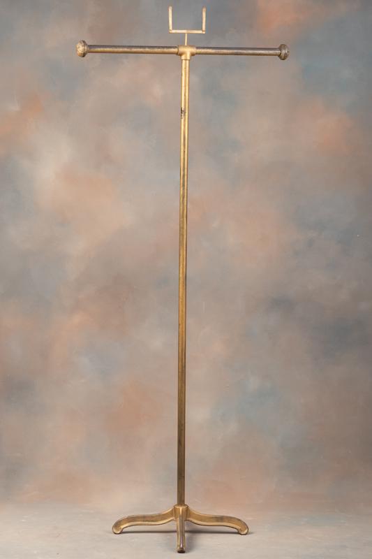 Vintage Cast Iron Floor Model Clothing Rack from an old Ft. Worth Haberdashery shop, measuring 66" T: Vintage Cast Iron Floor Model Clothing Rack from an old Ft. Worth Haberdashery shop, measuring 66" T with hanging rod 29" .