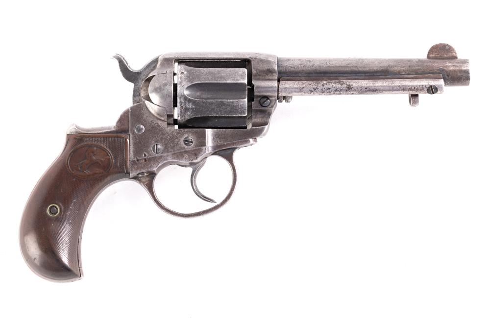 Antique Colt Model 1877, 41 caliber, Serial Number 133651, manufactured in 1894, 4 1/2" barrel.: Antique Colt Model 1877, 41 caliber, Serial Number 133651, manufactured in 1894, 4 1/2" barrel. Well used Colt with grips worn smooth. No finish left on gun and some pitting.