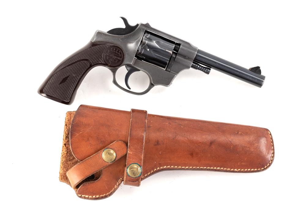 J. C. Higgins Model 88, .22 LR caliber, Serial Number 796696, with 4" barrel, 9-shot Revolver with: J. C. Higgins Model 88, .22 LR caliber, Serial Number 796696, with 4" barrel, 9-shot Revolver with swing out cylinder and original plastic grips. (MODERN)