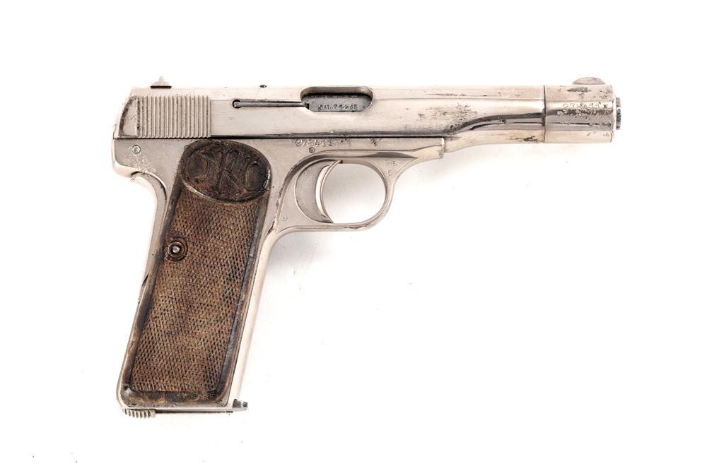 F-N Model 1922, 7.65 (32 ACP) caliber, Serial Number 278411. Well used Nickel finish Pistol with: F-N Model 1922, 7.65 (32 ACP) caliber, Serial Number 278411. Well used Nickel finish Pistol with wooden grips. Gun has replacement blue magazine. (MODERN)