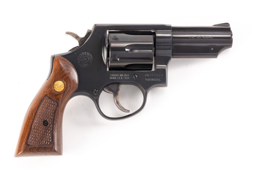 Taurus Model 65, .357 Magnum caliber, Serial Number J1351323, 3" barrel. Almost new in box, shows: Taurus Model 65, .357 Magnum caliber, Serial Number J1351323, 3" barrel. Almost new in box, shows powder rings on 3 of 6 cylinders otherwise in factory new condition. Sold with original box and paperw