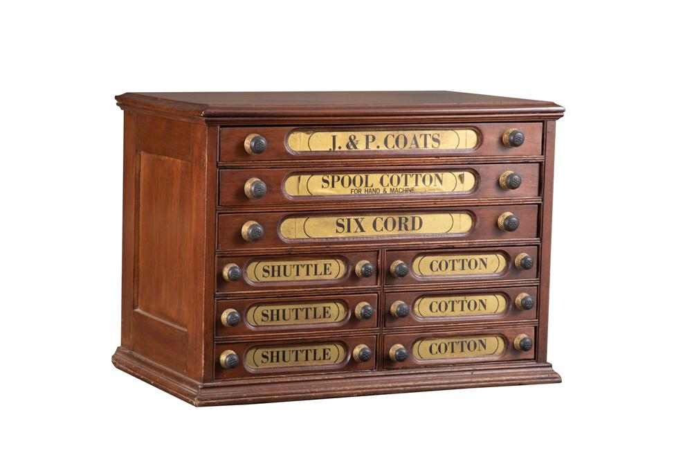 Antique walnut six drawered Spool Cabinet, circa 1890s, advertising "J.P. Coats Spool Cotton", 12: Antique walnut six drawered Spool Cabinet, circa 1890s, advertising "J.P. Coats Spool Cotton", 12 original brass and metal pulls. Overall very good condition, measures 20 1/2" T x 18 1/2" W x 28 1/2"