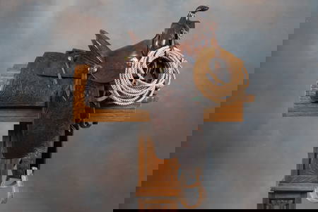 Vintage "R.T. Frazier, Pueblo, Colo." marked tooled Saddle, 12" seat, 4" cantle, maker marked 4