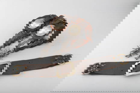 Vintage pair of August Buermann Spurs in the famous Ranger pattern, complete with heel chains and: Vintage pair of August Buermann Spurs in the famous Ranger pattern, complete with heel chains and original jingle bobs. Spurs are in excellent condition and are mounted with a pair of two-piece