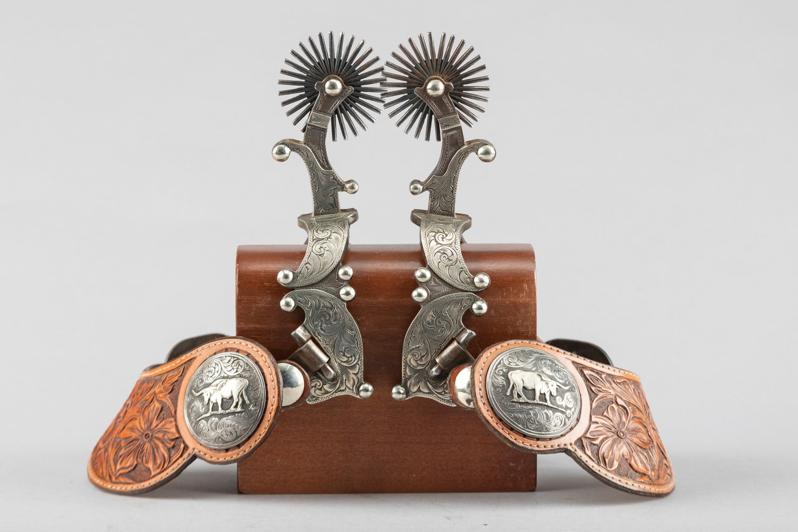 Pair of incredible Lytle & Mower double mounted Spurs showing some of the finest hand engraving in: Pair of incredible Lytle & Mower double mounted Spurs showing some of the finest hand engraving in the spur world, with unique heel bands and shanks, 2 1/4" multi-point rowels. Mounted with L&M straps
