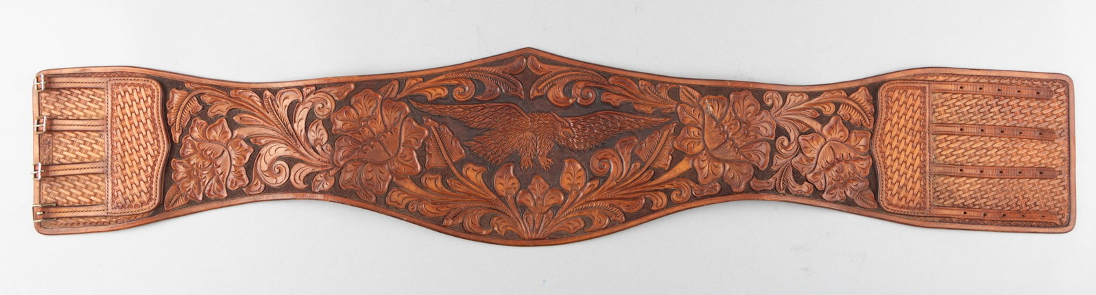 Outstanding "S.D. Myres, El Paso, Tex." marked highly floral tooled and basket weave Bronco Busting: Outstanding "S.D. Myres, El Paso, Tex." marked highly floral tooled and basket weave Bronco Busting Belt with tooled spread eagle in center, approximately 36" waist. Belt appears to have never been us