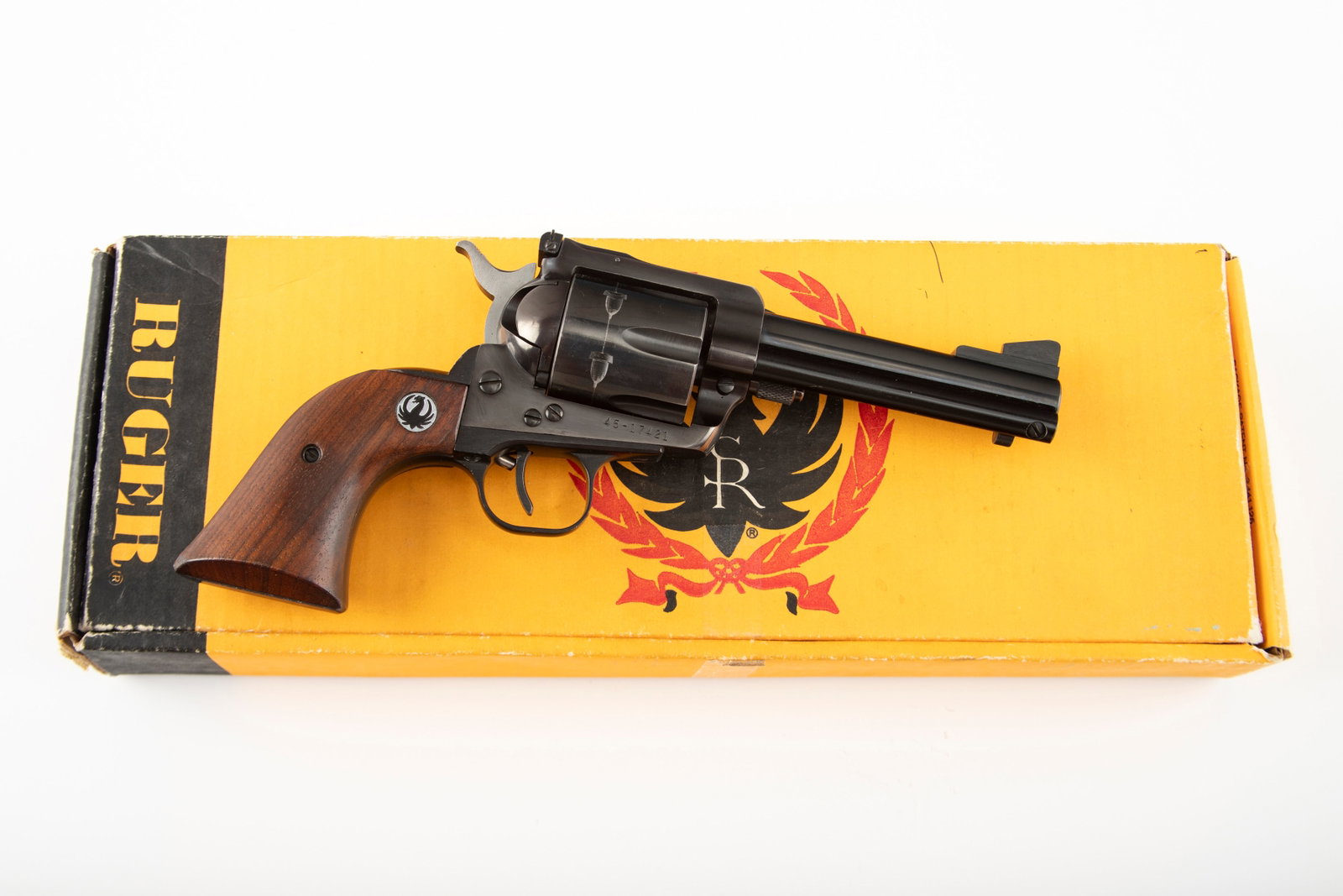 Ruger Blackhawk Revolver, .45 COLT caliber, SN 45-17421, manufactured in 1972, 4 1/2" barrel. Near: Ruger Blackhawk Revolver, .45 COLT caliber, SN 45-17421, manufactured in 1972, 4 1/2" barrel. Near new condition with slight turn line and slight muzzle thinning. Sold with original box. (MODERN) THE 