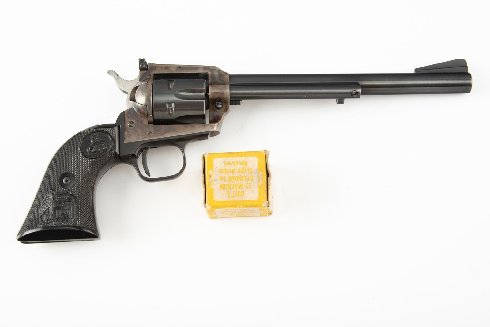 Colt New Frontier Buntline 22 Model Single Action Revolver, .22 caliber, SN G40882, manufactured in: Colt New Frontier Buntline 22 Model Single Action Revolver, .22 caliber, SN G40882, manufactured in 1973, 7 1/2" barrel. Colt is in near mint, new condition with very slight thinning on left muzzle ed