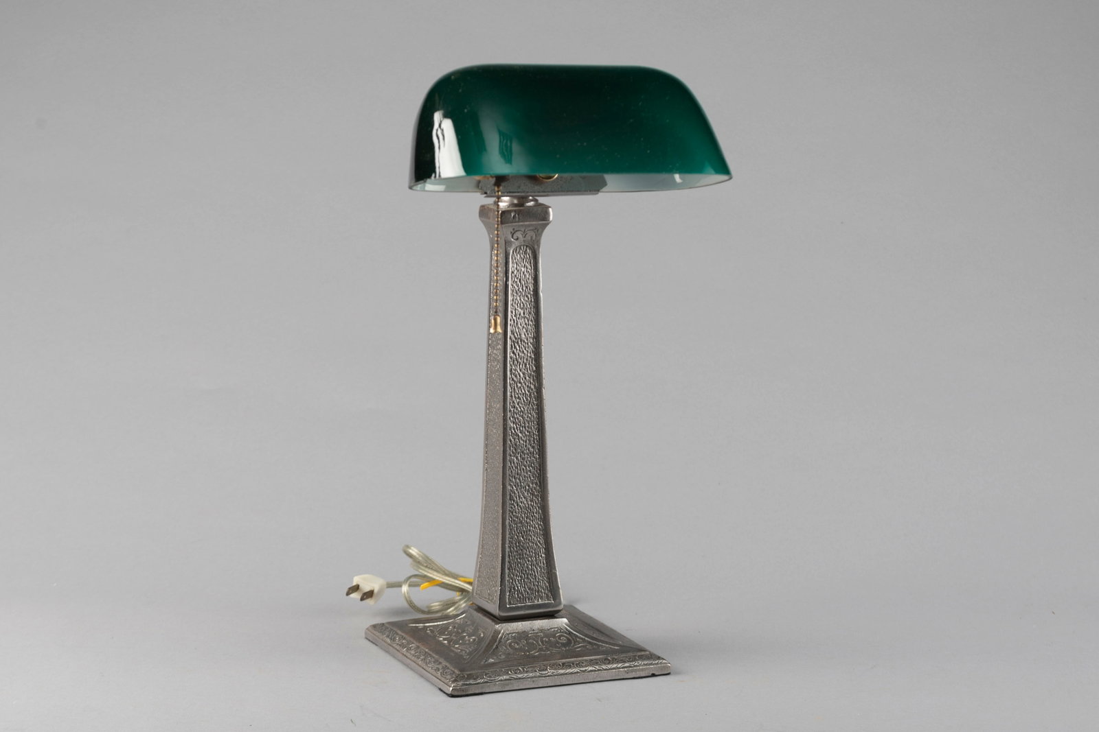 Antique Aladdin Desk Lamp, circa 1920-1930s, professionally restored and rewired with its original: Antique Aladdin Desk Lamp, circa 1920-1930s, professionally restored and rewired with its original Emerald case glass shade. Shade has chip underneath on left side, 17 1/2" T x 6 1/2" embossed square 