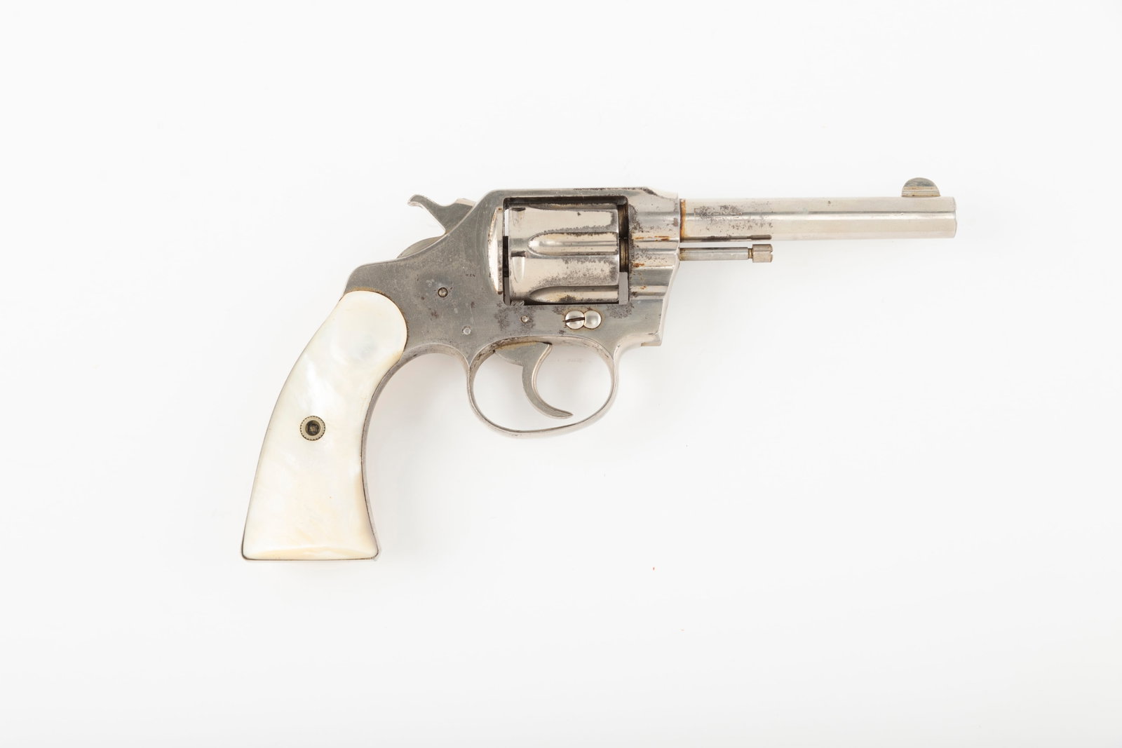 Colt New Police Model Revolver, .32 caliber, SN 58002, manufactured in 1907, last year of: Colt New Police Model Revolver, .32 caliber, SN 58002, manufactured in 1907, last year of production, 4" barrel. This transitional model has barrel stamped "Colt New Police" on left side and "Police P