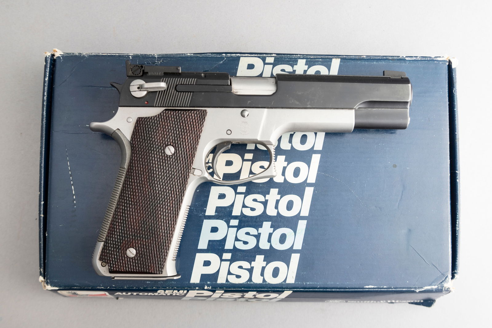 Smith and Wesson Model 745 Pistol, .45 ACP caliber, SN TBJ2040, manufactured in 1987, 3 1/2" barrel.: Smith and Wesson Model 745 Pistol, .45 ACP caliber, SN TBJ2040, manufactured in 1987, 3 1/2" barrel. This Smith and Wesson was sent to Novak's for custom work which included Bomar Sight, trigger guard