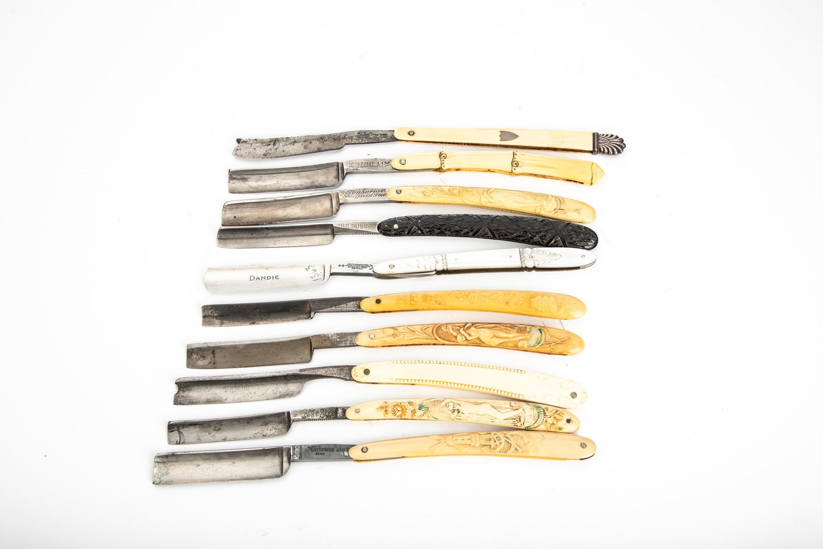 Collection of 10 vintage Straight Razors, many are marked "Germany", some have embossed ladies, one: Collection of 10 vintage Straight Razors, many are marked "Germany", some have embossed ladies, one has a windmill, several art deco, all have good blades. Will be sold as a collection. THE LATE ROGER