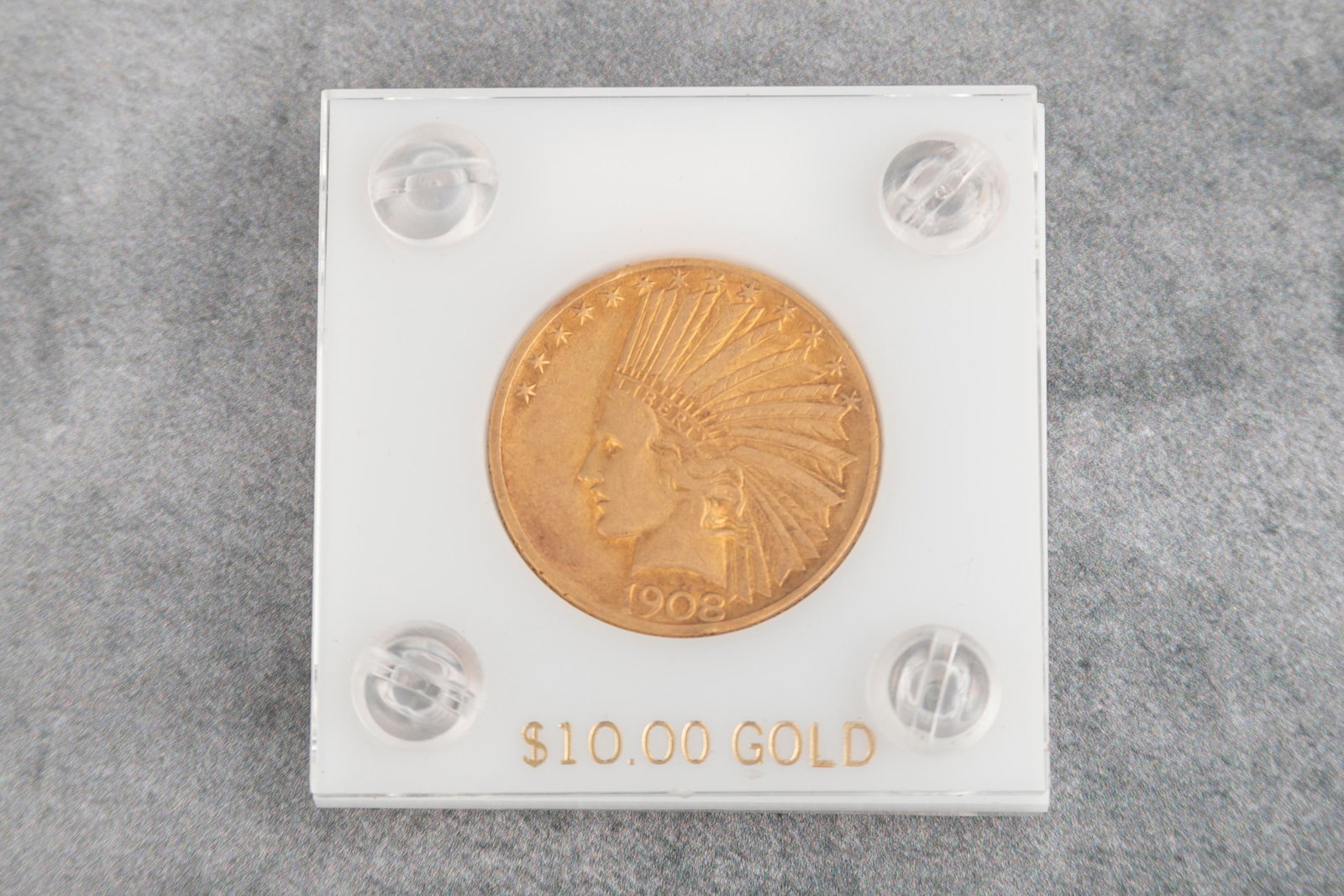 U.S. $10.00 INDIAN HEAD GOLD COIN. This beautiful coin was minted in 1908 and is in high condition.: U.S. $10.00 INDIAN HEAD GOLD COIN. This beautiful coin was minted in 1908 and is in high condition. The Gold Coin has the Bust of Liberty wearing an Indian Headdress on the front and a standing Bald E