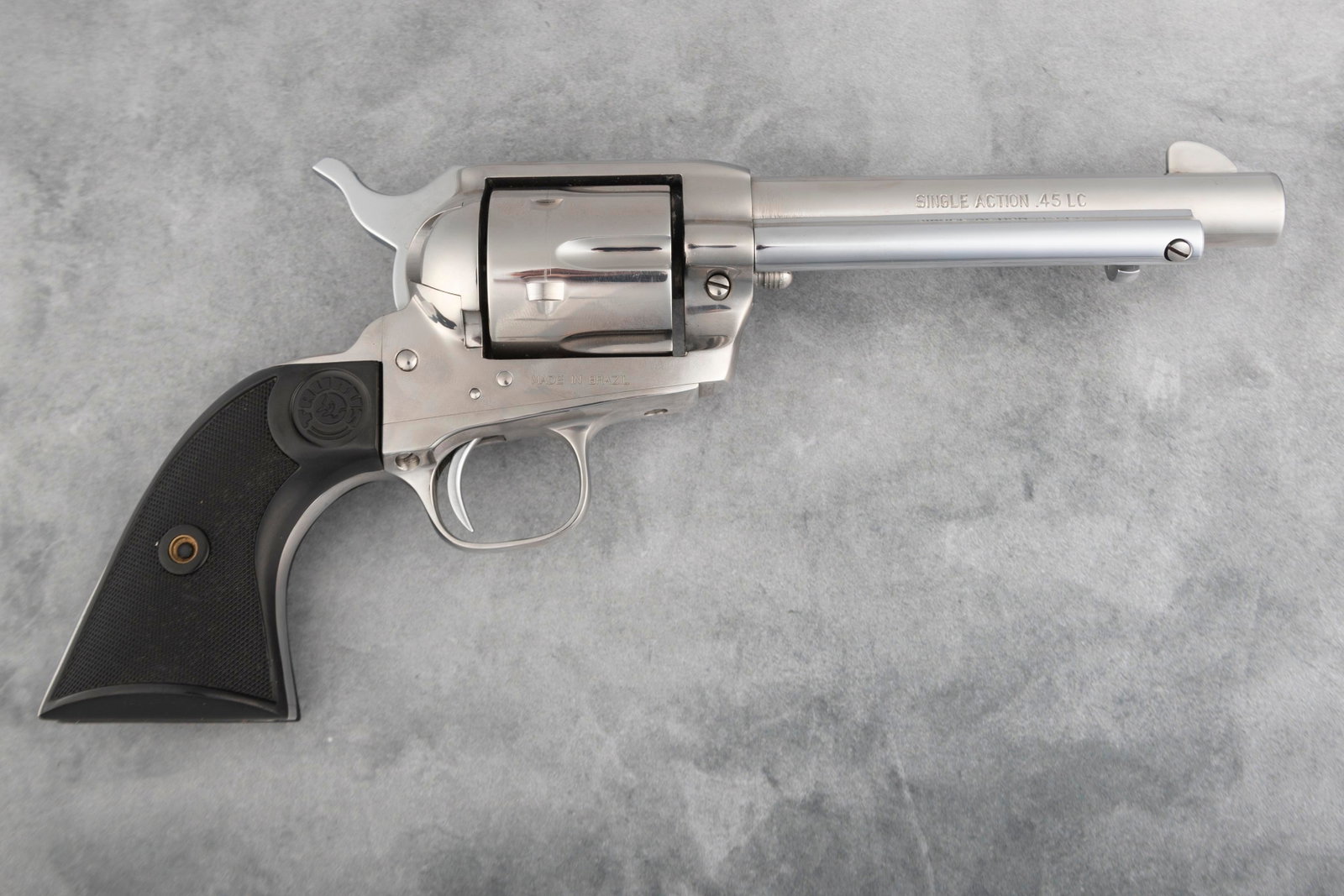 Taurus SA Revolver, .45 LR caliber, SN ZD382065, factory nickel finish, 5 1/2" barrel, near pristine: Taurus SA Revolver, .45 LR caliber, SN ZD382065, factory nickel finish, 5 1/2" barrel, near pristine condition with factory "Taurus" marked grips. (MODERN) FROM THE LATE PAUL CHAPMAN ESTATE.