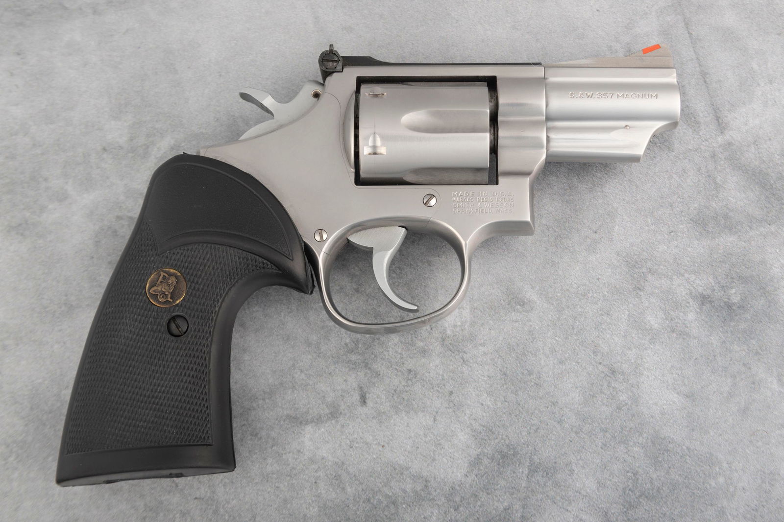 Smith & Wesson, Model 66-2 DA Revolver, .357 MAG caliber, SN ALC2813, stainless, 2 1/2" barrel,: Smith & Wesson, Model 66-2 DA Revolver, .357 MAG caliber, SN ALC2813, stainless, 2 1/2" barrel, fitted with a pair of checkered rubber grips. Overall condition is very good with very faint turn lines.