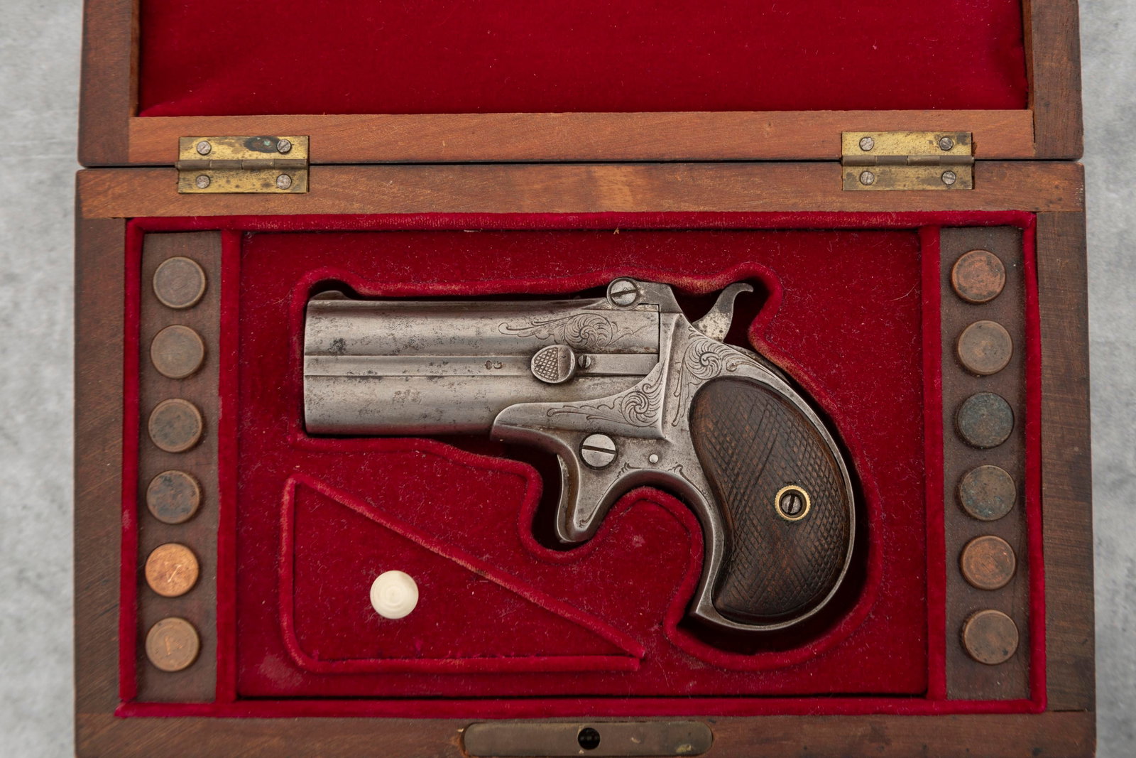 Antique Cased O/U Remington Derringer, period engraved, .41 caliber, SN 6 shows under the barrel.: Antique Cased O/U Remington Derringer, period engraved, .41 caliber, SN 6 shows under the barrel. NOTE: Engraved on bottom of grip strap "Dr. Frank Powell, from your friend W. F. C." There's a good po