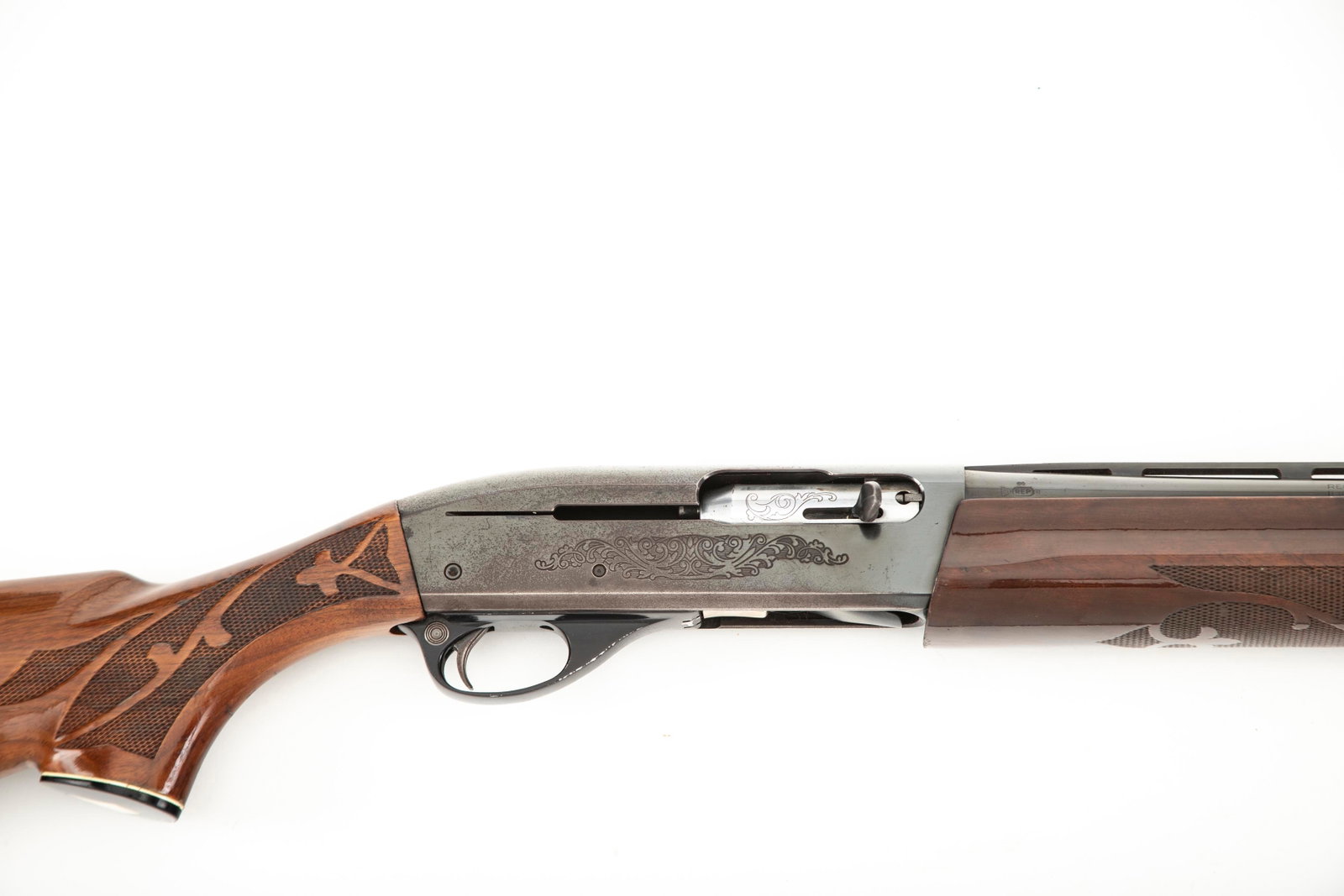 Remington Model 1100, 20 ga. Semi-Auto Shotgun, SN N781824K, 28" vented barrel, fancy wood and: Remington Model 1100, 20 ga. Semi-Auto Shotgun, SN N781824K, 28" vented barrel, fancy wood and checkering, refinished with light thinning on receiver, light handling marks on receiver, 13 1/4" trigger
