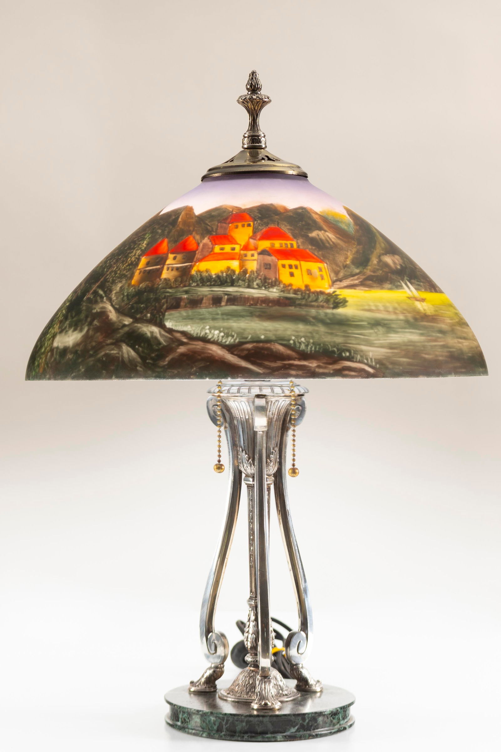 Signed Pairpoint Table Lamp with 15" reverse painted scenic shade. Lamp stands 22" tall, has been: Signed Pairpoint Table Lamp with 15" reverse painted scenic shade. Lamp stands 22" tall, has been professionally rewired.