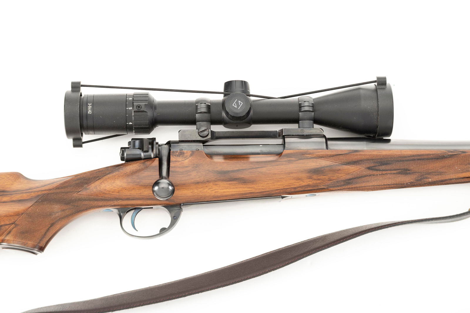 Custom Monte Bolt Action Rifle, Manderino, .338 caliber, SN 1016, blue finish, 24" barrel, mounted: Custom Monte Bolt Action Rifle, Manderino, .338 caliber, SN 1016, blue finish, 24" barrel, mounted with a Zeiss Terra 3X Scope, 14 3/8" trigger pull, fine wood, fine checkering, fitted with a leather