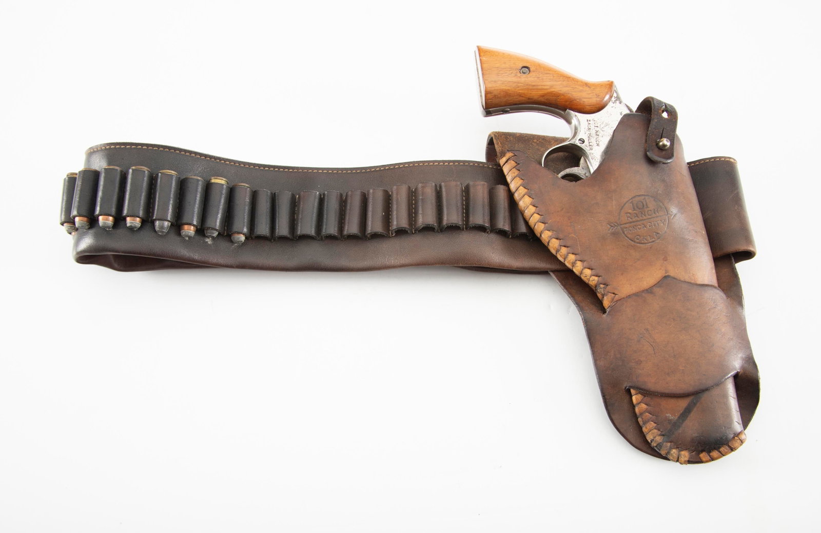 ATTENTION COLLECTORS OF 101 RANCH MARKED ITEMS:: ATTENTION COLLECTORS OF 101 RANCH MARKED ITEMS: Smith & Wesson Double Action Hand Ejector Revolver, .44 SPL caliber, SN 32977, nickel finish, showing some flaking on nickel, 5" barrel, two-piece w