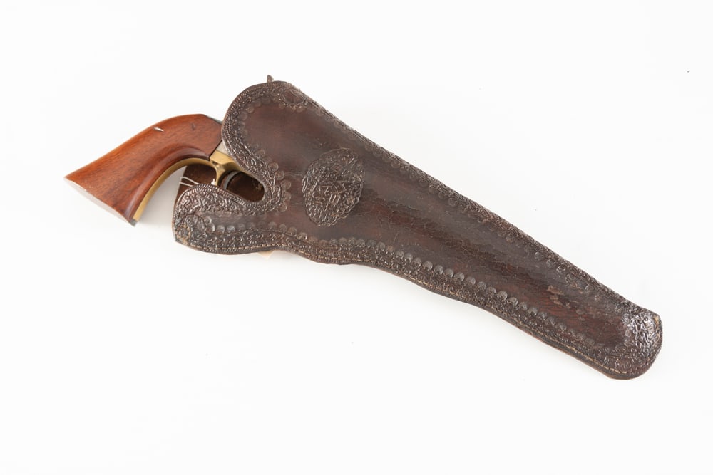 Vintage leather Slim Jim Holster for a Model 1860 Army Revolver, very good condition with lightly: Vintage leather Slim Jim Holster for a Model 1860 Army Revolver, very good condition with lightly tooled border, raised tooled center marked "Waco, Texas". Complete with belt loop. REVOLVER NOT INCLUD