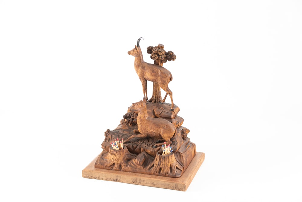 Very ornate German Black Forest hand carved Mountain Goat Scene Match Holder, circa 1920s, mounted: Very ornate German Black Forest hand carved Mountain Goat Scene Match Holder, circa 1920s, mounted on wooden board, 15" T x 9 1/2" D x 12" W. Shows great detail.