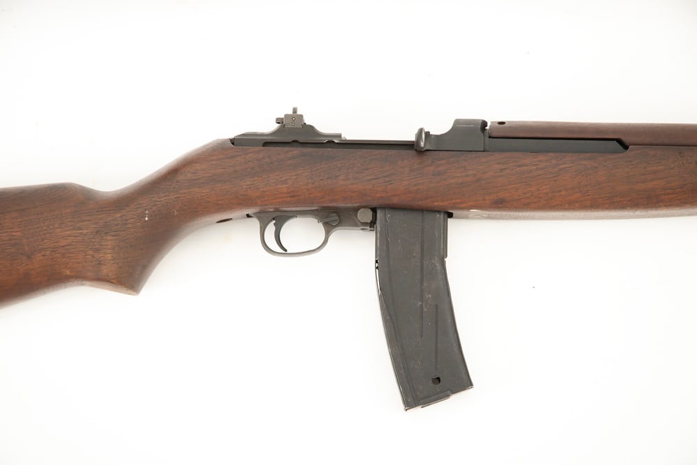 Quality Arms, .30 caliber M1 Carbine, SN 1606033, parkerized finish with Arsenal Number 38. Barrel: Quality Arms, .30 caliber M1 Carbine, SN 1606033, parkerized finish with Arsenal Number 38. Barrel is marked "Underwood 6-43" with bomb insignia. (MODERN)