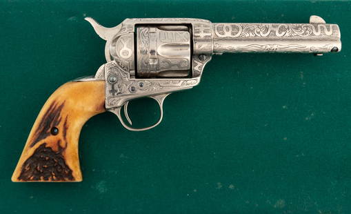 Colt SAA Revolver, .45 caliber, SN 183345, nickel finish with fire blue screws, hand engraved by: Colt SAA Revolver, .45 caliber, SN 183345, nickel finish with fire blue screws, hand engraved by Texas Master Engraver David Wade Harris, 4 3/4" barrel. Full coverage in the famous Texas Brands