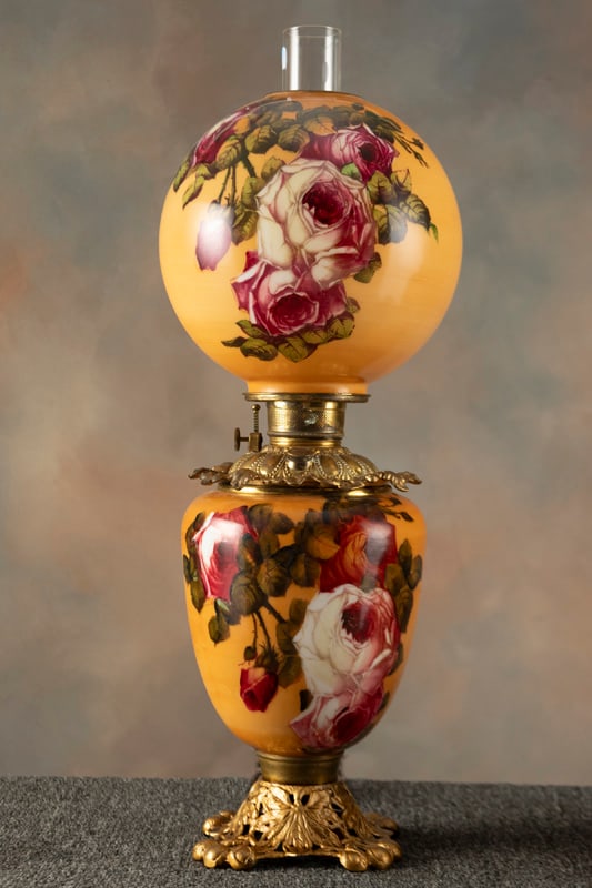 One of a pair of large hand painted Gone With the Wind Lamps, circa 1880-1890, with 10" hand painted: One of a pair of large hand painted Gone With the Wind Lamps, circa 1880-1890, with 10" hand painted ball shade and matching base on heavy embossed cast iron base, 26" tall. Lamp was originally in oil