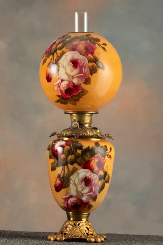 One of a pair of large hand painted Gone With the Wind Lamps, circa 1880-1890, with 10" hand painted: One of a pair of large hand painted Gone With the Wind Lamps, circa 1880-1890, with 10" hand painted ball shade and matching base on heavy embossed cast iron base, 26" tall. Lamp was originally in oil