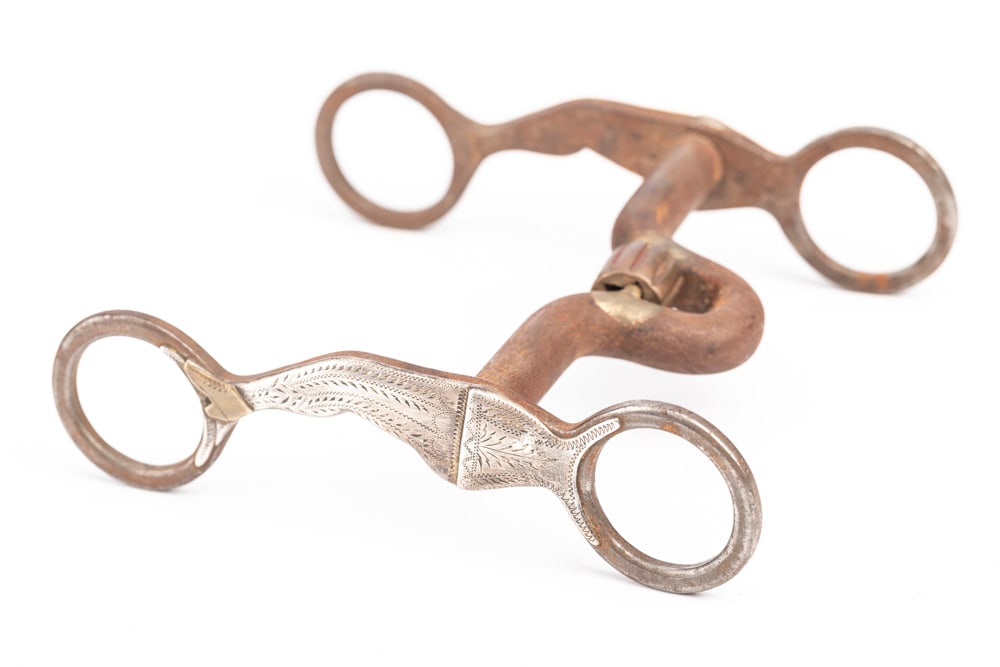 Silver mounted gal-leg Bit by Oklahoma Bit and Spur Maker Jerry Wallace with copper roller. NOTE:: Silver mounted gal-leg Bit by Oklahoma Bit and Spur Maker Jerry Wallace with copper roller. NOTE: Fine engraving. THE LATE OTIS HIBLER ESTATE.