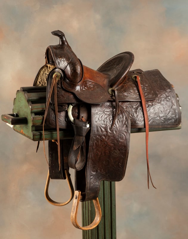 Vintage R. T. Frazier brown tooled Saddle, 12" seat, 4" cantle. Overall condition is very good,: Vintage R. T. Frazier brown tooled Saddle, 12" seat, 4" cantle. Overall condition is very good, leather is supple. Saddle is marked three times, mounted with wooden ox bow stirrups.