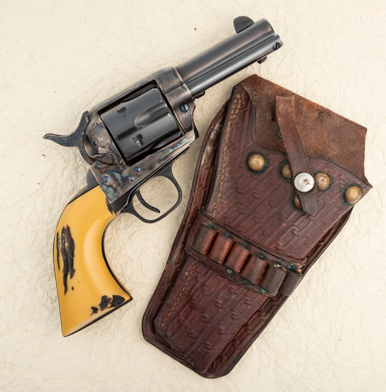 Cimmaron Sheriffs Model SA Revolver, .357 MAG caliber, SN C98342, case hardened frame with blue: Cimmaron Sheriffs Model SA Revolver, .357 MAG caliber, SN C98342, case hardened frame with blue cylinder and 3 1/2" barrel. Very fine condition with light turn line. Accompanied by a vintage tooled Ho