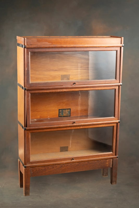 Antique oak three stack Lawyer Bookcase, circa 1910-1920s, original finish, 52 1/2" T x 34" W x 9: Antique oak three stack Lawyer Bookcase, circa 1910-1920s, original finish, 52 1/2" T x 34" W x 9 1/2" D. ORIGINALLY FROM THE LAW OFFICE OF THE LATE OTIS HIBLER.